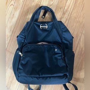 Pacsafe black backpack